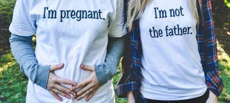 This couple ROCKED the T-shirt baby announcement