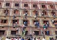 600 students expelled after parents scale school walls to help them CHEAT in their exams