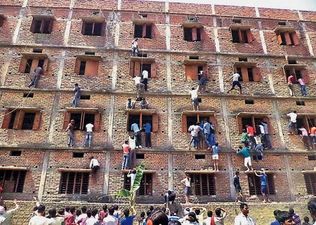 600 students expelled after parents scale school walls to help them CHEAT in their exams