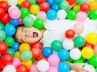 Another way your child can use those ‘ball pit’ balls that are all over the house
