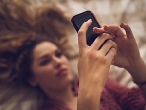 Using your phone in bed could be costing you an hour of sleep