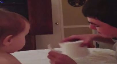 WATCH: Baby is amazed by toilet paper trick