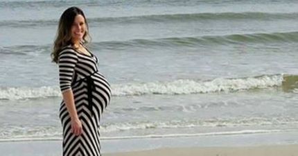 Pregnant Woman Gets Photobombed by Dolphin