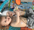 Video: Twin Boys Once Conjoined Cuddle Face To Face For The First Time