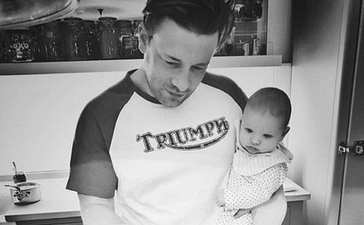 Uh oh! This picture of Jamie Oliver holding his baby son has sparked a safety debate