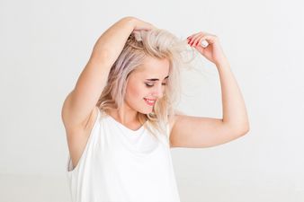 Here’s why you get those yellow pit stains on white tops