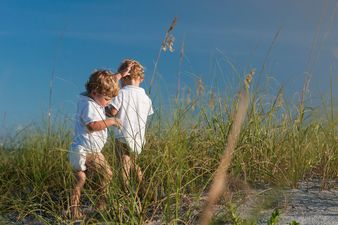 Adults and toddler hit by lightning saved by beach wedding guests