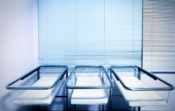 Woman who accidentally suffocated newborn sues hospital