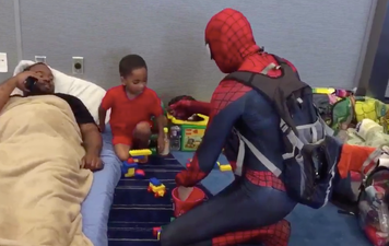 Neighbourhood Spiderman makes Houston kids smile