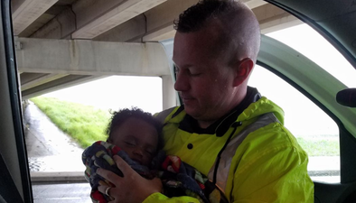 Mum reunited with baby after cops save girl from hurricane flood waters