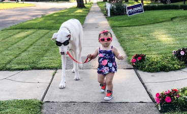 This little lady and her pup are the absolute definition of friendship goals