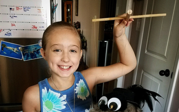 ‘Never give up’: 10-year-old breast cancer survivor shares her story