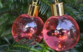 This company is selling Christmas tree baubles filled with PINK gin