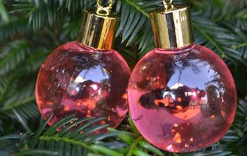 This company is selling Christmas tree baubles filled with PINK gin