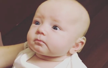 Video of ‘profoundly deaf’ baby hearing mum speak for first time