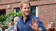 These pictures of Prince Harry playing with a baby will brighten up your day