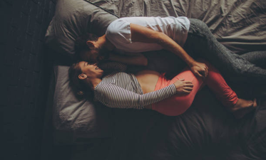 The 10 stark truths of sharing a bed with a growing baby bump