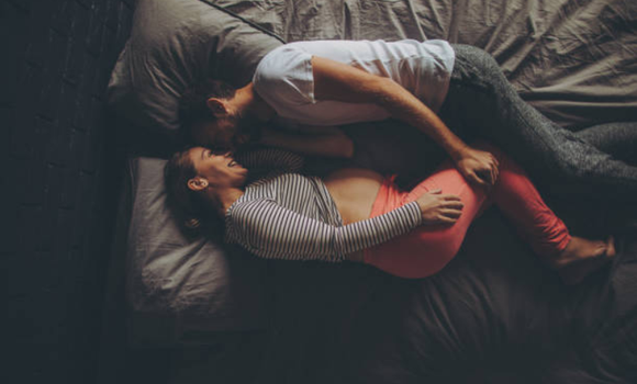 The 10 stark truths of sharing a bed with a growing baby bump
