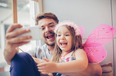 This daughter taught her dad how to take a selfie and it’s so beautiful