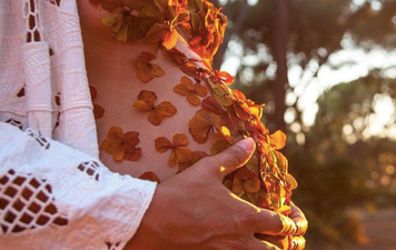 This floral pregnancy photoshoot is like nothing we’ve seen before