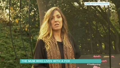 This mum keeps a fox as a pet and her kids play with him too