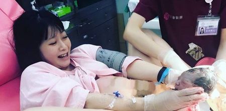 Facebook banned this image of a woman delivering her own baby