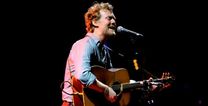 Glen Hansard was pulled into a chipper to sing on Stephen’s Night