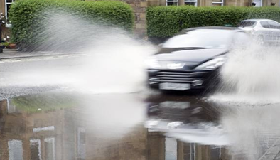 Driver faces hefty fine after splashing mum and two kids with puddle