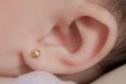 Mother shares ear piercing story to warn other parents to be wary