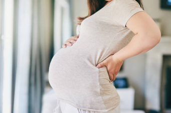 A woman has given birth to a baby weighing almost 14lbs without pain relief