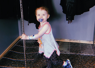 Two-year-old girl overcomes paralysis after cancer to learn to walk