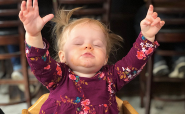 Dad photographs daughter trying pizza for the first time and she is all of us