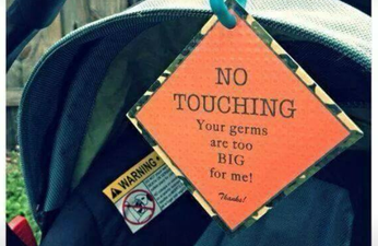 Mum buys ‘germs’ sign for her baby’s car seat and there are very mixed reactions