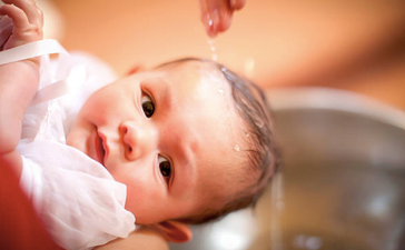 People are really stressing out over this viral video of a baby being baptised