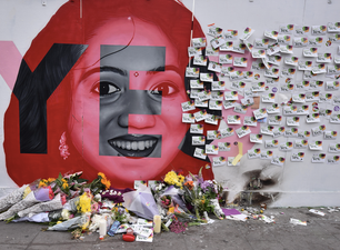 People are leaving flowers, tributes and messages at the mural of Savita in Dublin