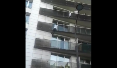 Man hailed a hero after he climbs a building to save a dangling toddler