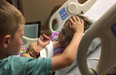 Photo of little boy saying goodbye to his sister before she passes away goes viral