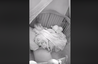 This little girl tucking her frightened dog into her bed is the sweetest thing