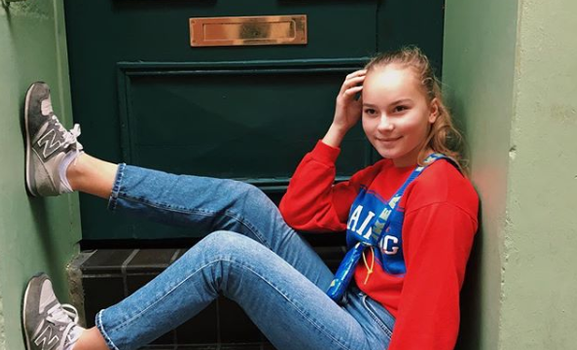 This teenager is making a point about sustainable fashion in a dress that's made of a potato sack