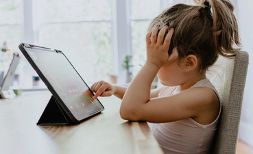 Parents’ mental health is being affected by children’s screen time, new study finds