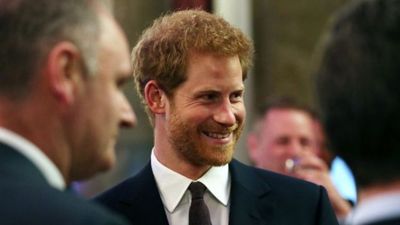 Prince Harry compares growing up with royal family to “living in a zoo”