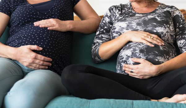 same sex couple give birth