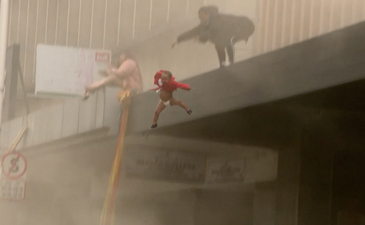 Mother throws baby off burning building into strangers’ arms