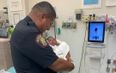 Police officer makes incredible catch after baby is thrown from balcony