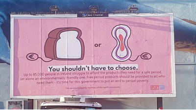 Billboard outside Minister Donnelly’s local shop sends message on period poverty