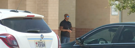Parents in Texas have taken to standing outside schools to protect their children