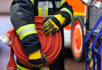 Three children rescued from fire at derelict pub in Manchester