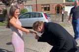 Bono bumps into girl on her way to the Debs as he visits old home