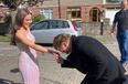 Bono bumps into girl on her way to the Debs as he visits old home