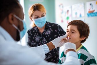 Parents urged to keep children with flu symptoms out of school